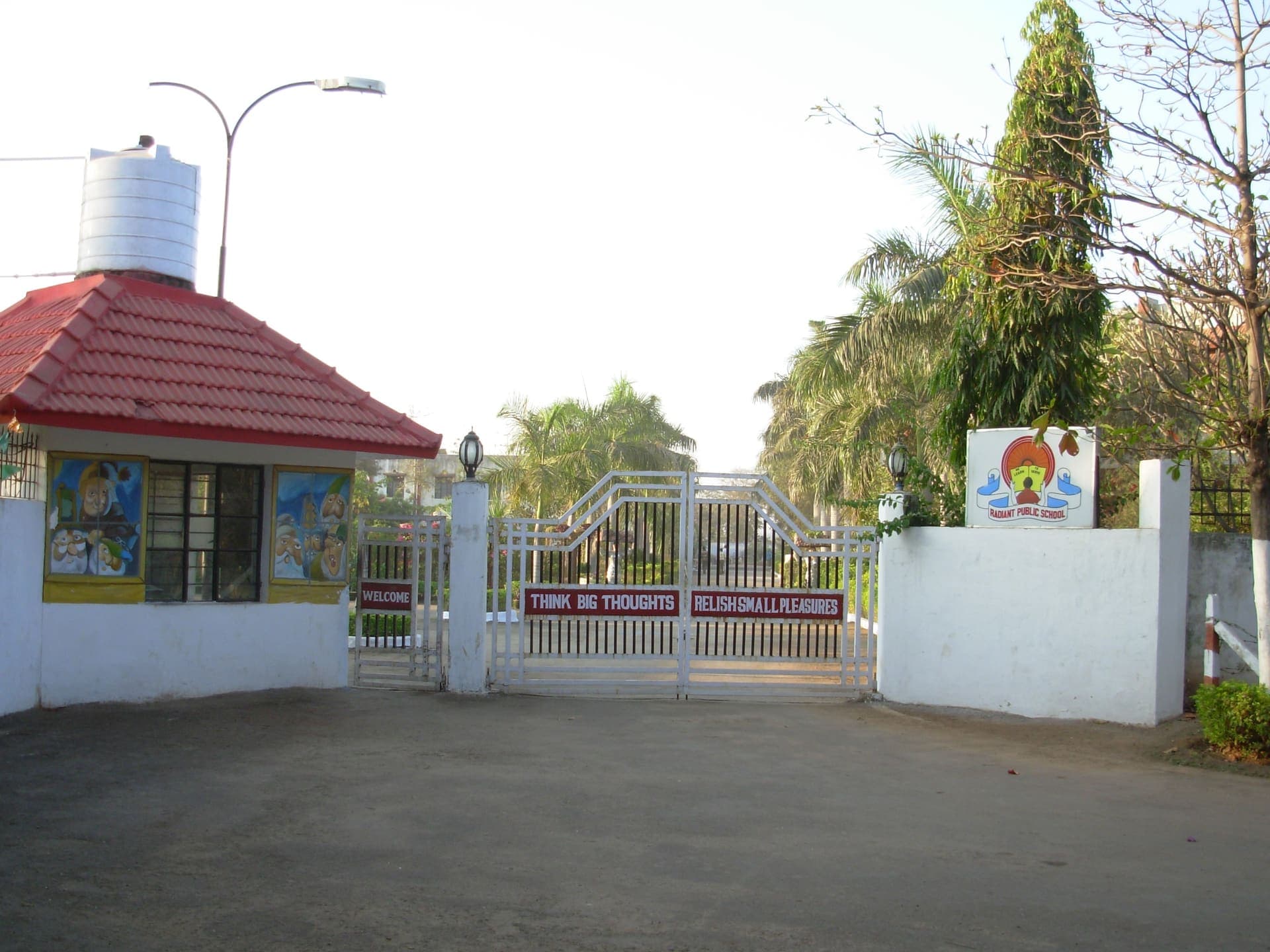 The main gate of Radiant Public School with the school motto