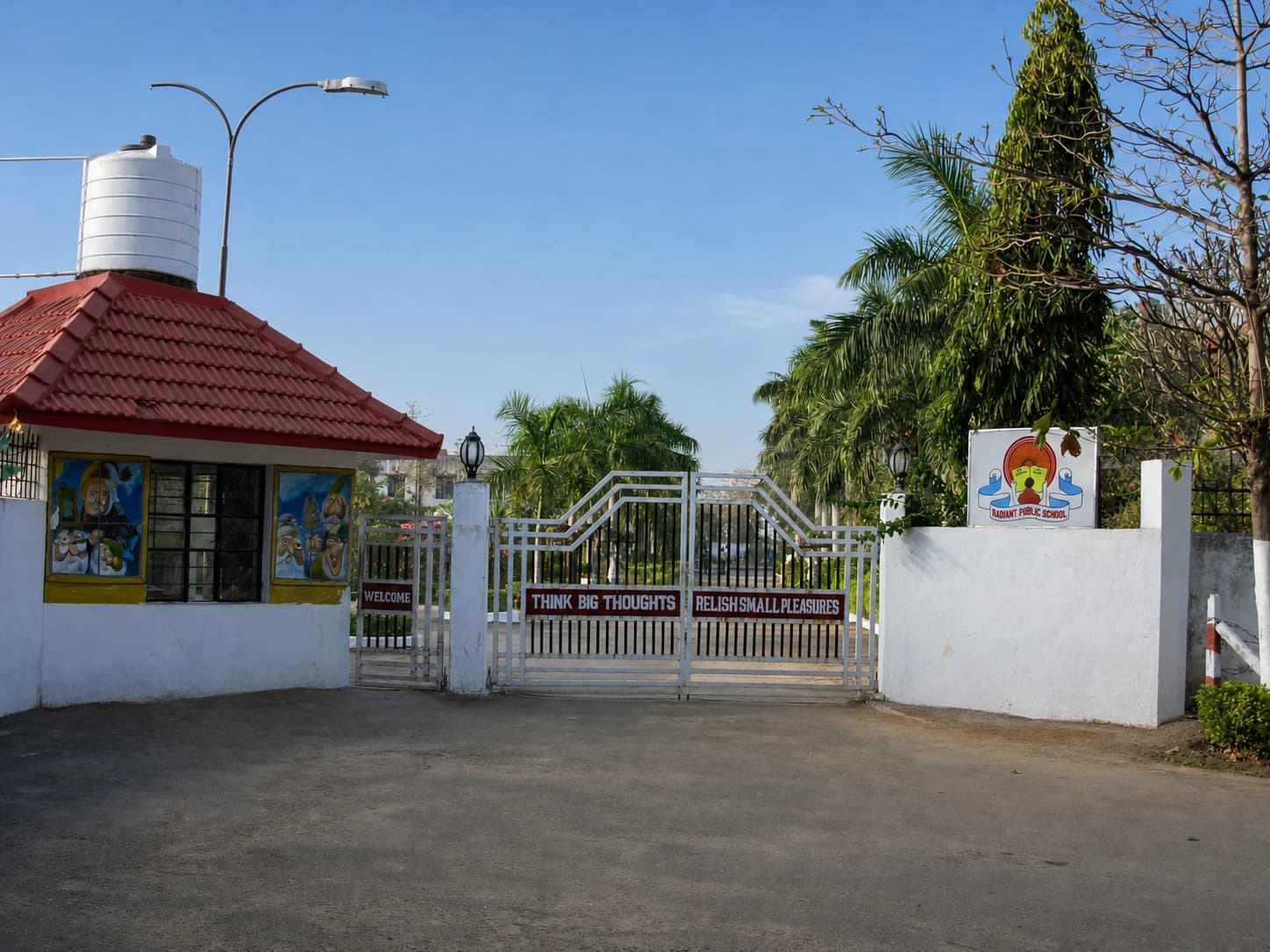 The main gate of Radiant Public School with the school motto