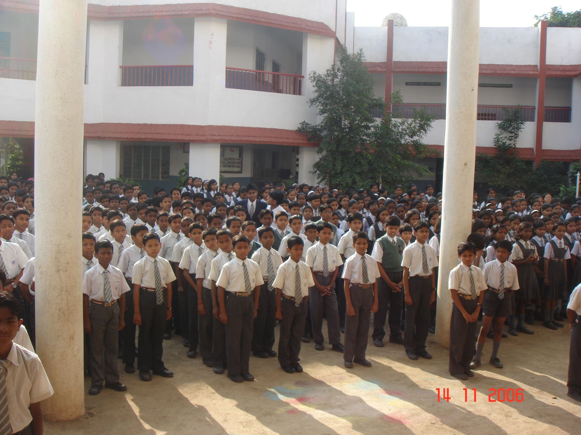 Students attending a formal school assembly